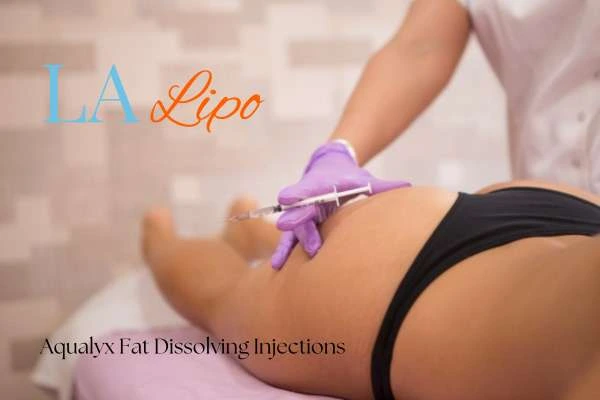 Woman having fat dissolving injections Wrexham on thighs