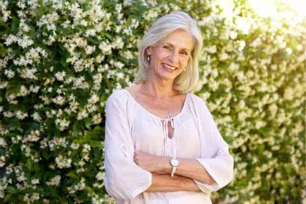Older woman happy with urinary incontinence treatment Wrexham