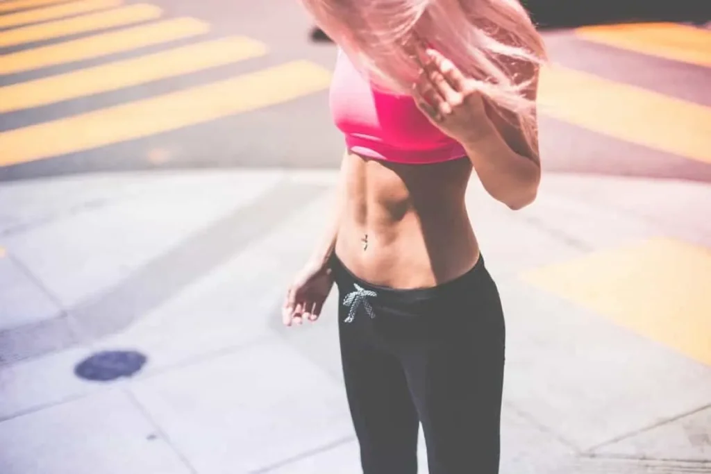 Woman with toned stomach after LA-EMS Body Sculpting Treatment Wrexham